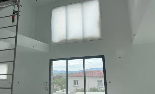 Peinture de finition à l'airless, maison neuve à Mornant